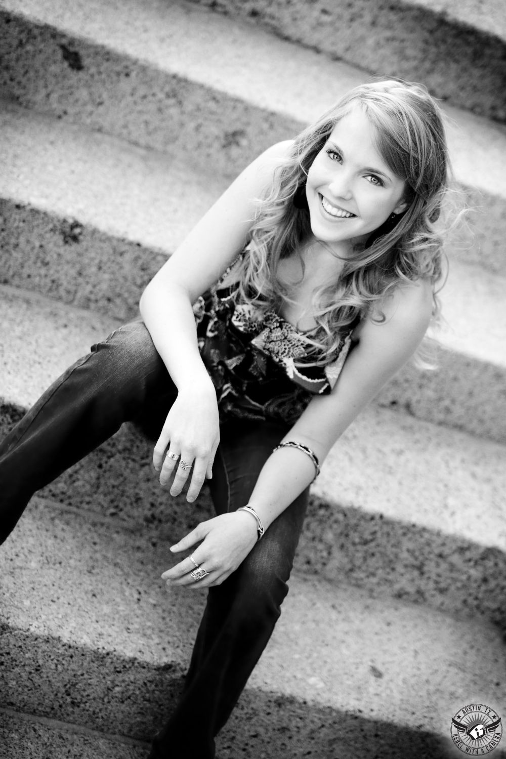 Senior photos in Austin of girl on stairs at the Texas State Capitol.
